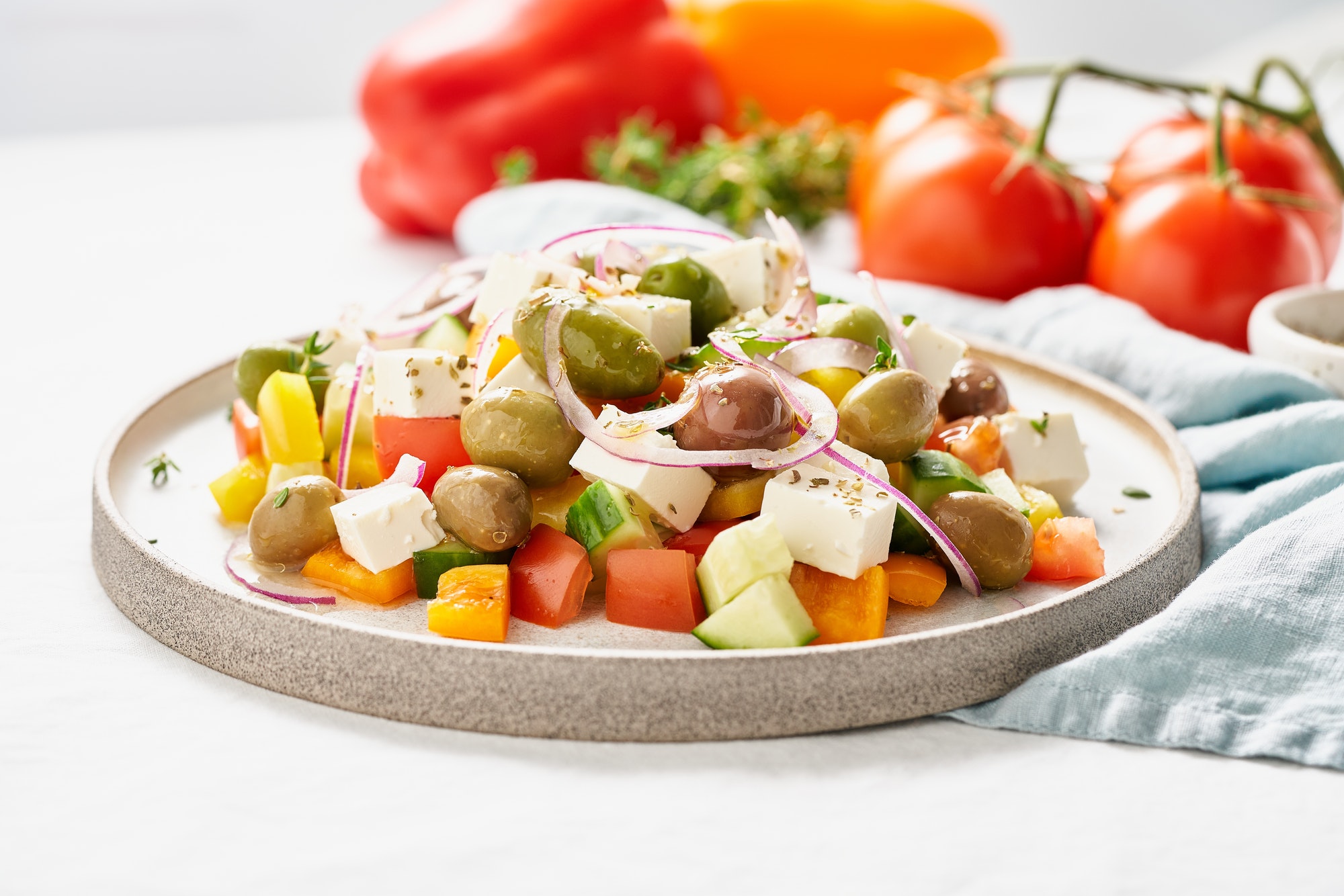 Greek village salad horiatiki with feta cheese and vegetables, vegeterian mediterranean food